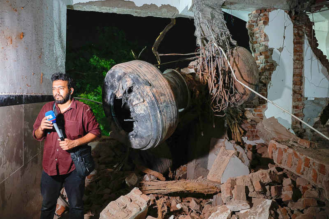 Air India Dreamliner crashes into  college hostel, kills over 240